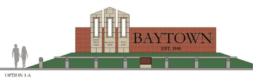 Three pillars labeled "Goose Creek 1916, Baytown 1919, Pelly 1917" full sign reads"BAYTOWN 