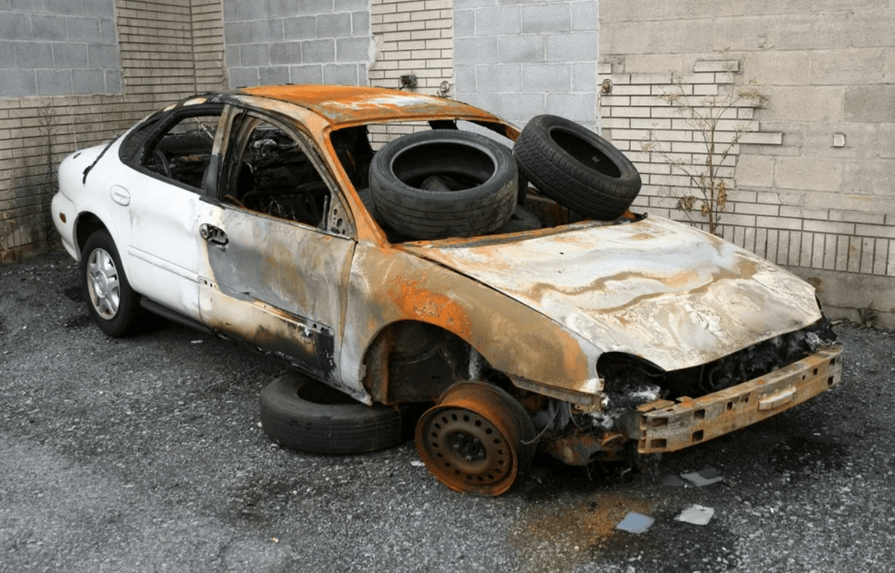 Abandoned car that caught fire and was left behind